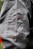 Munkavédelmi kabát, Basic, 35% pamut, 65% polyester, többfunkciós zsebek, gumírozott derék, CE EN341, S/48